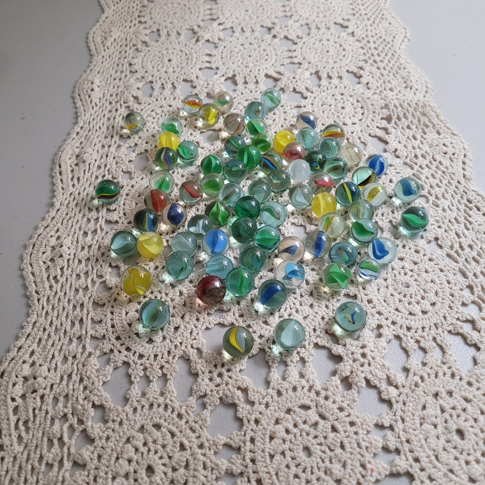 Seventy eight (78) assorted Glass marbles Most Are 5/8 in